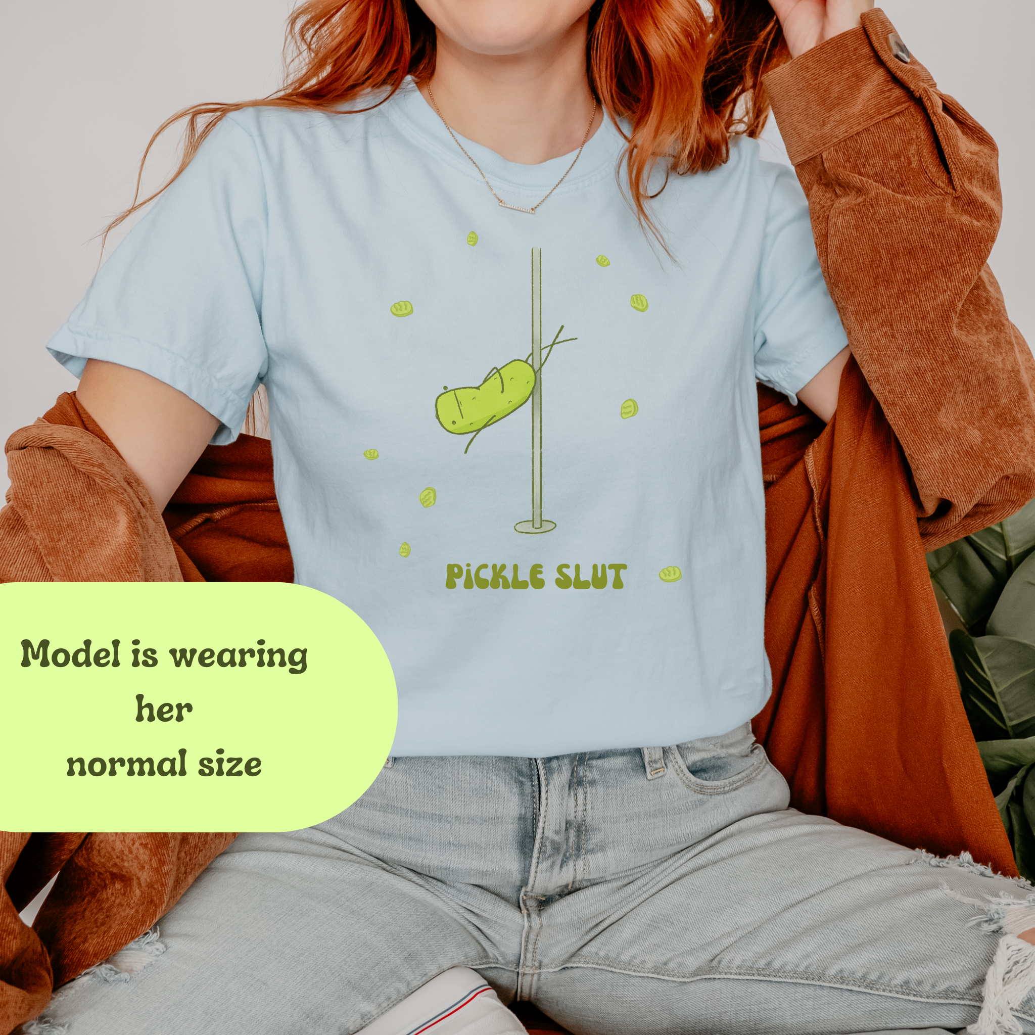 Person wearing a relaxed fit 'Pickle Slut' t-shirt with pole dancing pickle graphic, styled for casual outfit