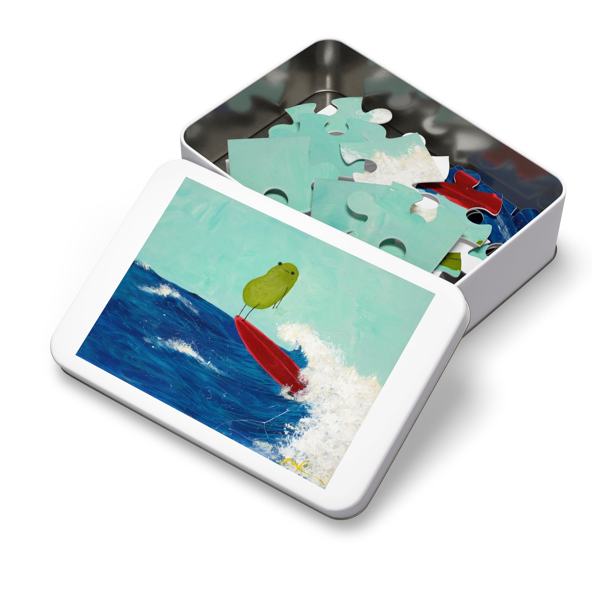 Jigsaw puzzle with a pikle design in a metal tin